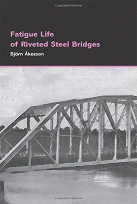 FATIGUE LIFE OF RIVETED RAILWAY BRIDGES